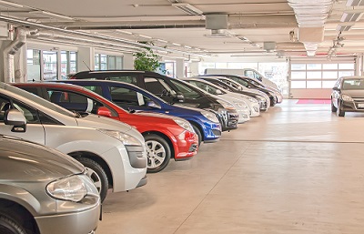 bigstock-Many-Cars-In-Parking-Lot-Or-Ga-64059436